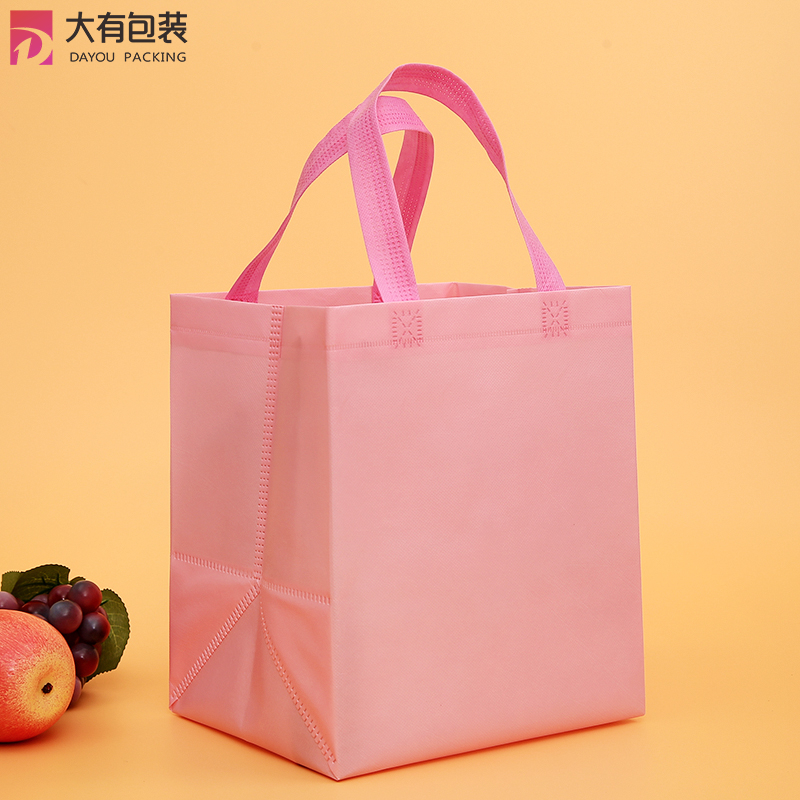 Low MOQ Factory Eco-friendly Custom Printed Logo Pink Reusable Folding Non Woven Shopping Bag